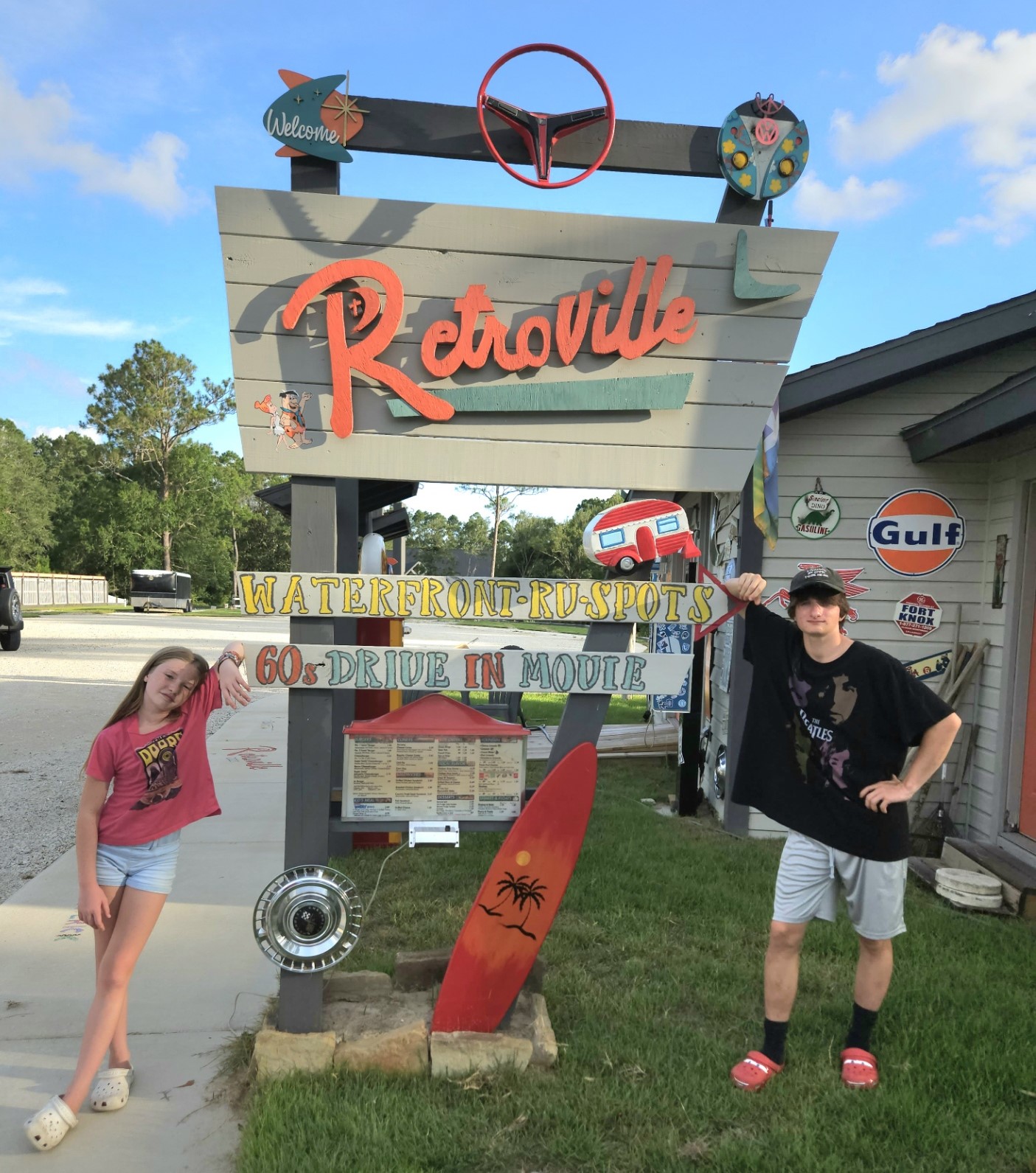 Kids by Retroville sign