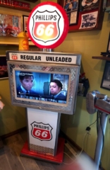 Phillips 66 gas pump with TV screen built into the face