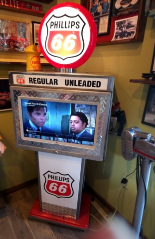 Phillips 66 gas pump with TV screen built into the face