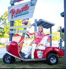 Woman sitting on retro golf cart