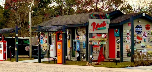 Retroville Rv Park Vintage -Style office with Mid century gas pumps and Retroville Sign at Freeport Beach Campground is a great Photo Opp for classic cars